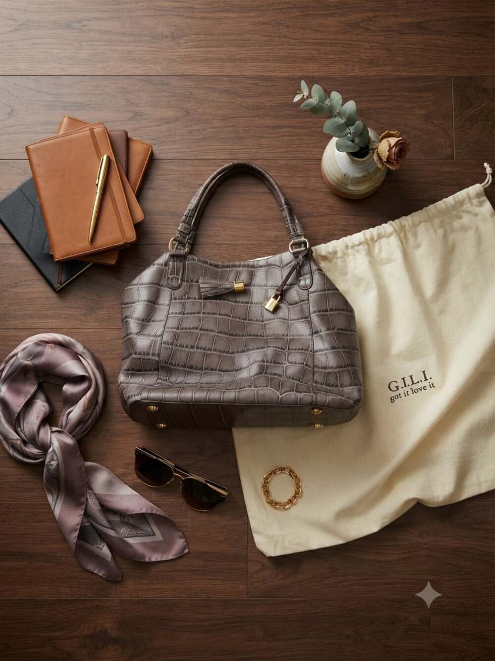 G.I.L.I. Croco-Embossed Italian Leather Handbag with Tassel and Lock Detail